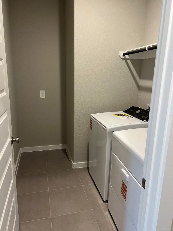 14330 Azalea Tree Drive Magnolia, TX 77354 - Photo 7 of 35 a utility room with dryer and washer