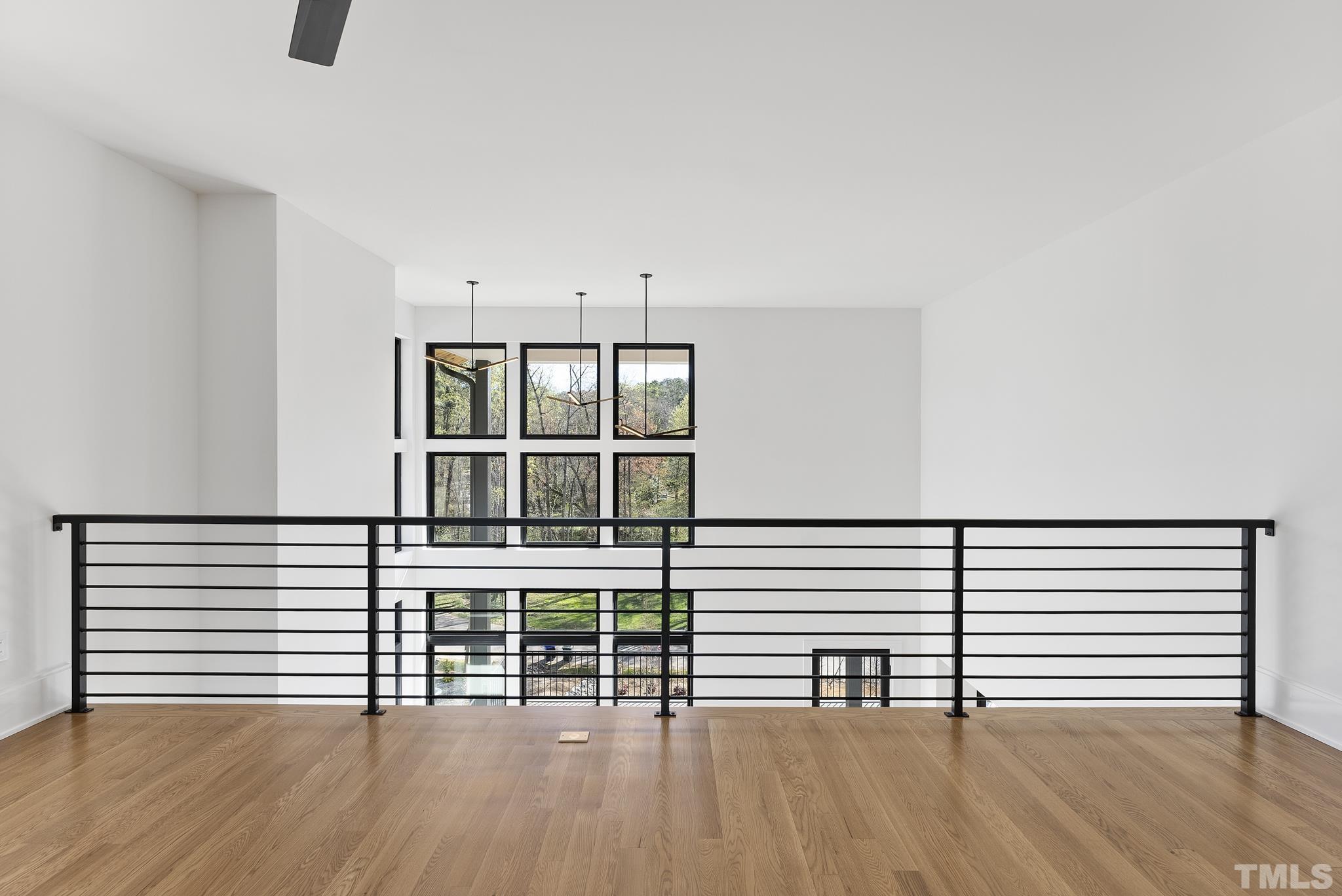 1621 Nottingham Road Raleigh, NC 27607 - Photo 19 of 49 a view of a room with wooden floor and a window