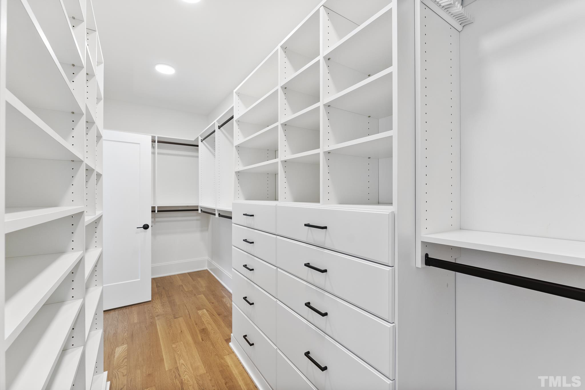 1621 Nottingham Road Raleigh, NC 27607 - Photo 23 of 49 a view of walk in closet with empty racks