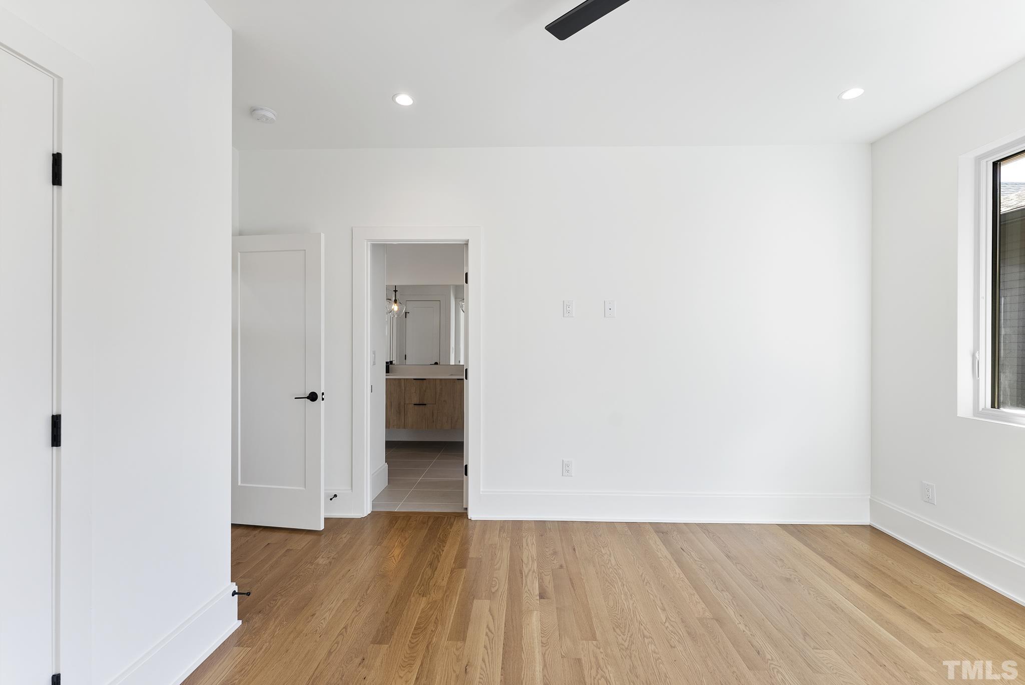 1621 Nottingham Road Raleigh, NC 27607 - Photo 27 of 49 a view of a room with wooden floor and a window