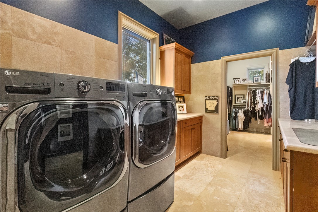 8847 Bubbling Springs Road South Harrison, AR 72601 - Photo 26 of 60 Primary Laundry with Dual Walk-In Closets