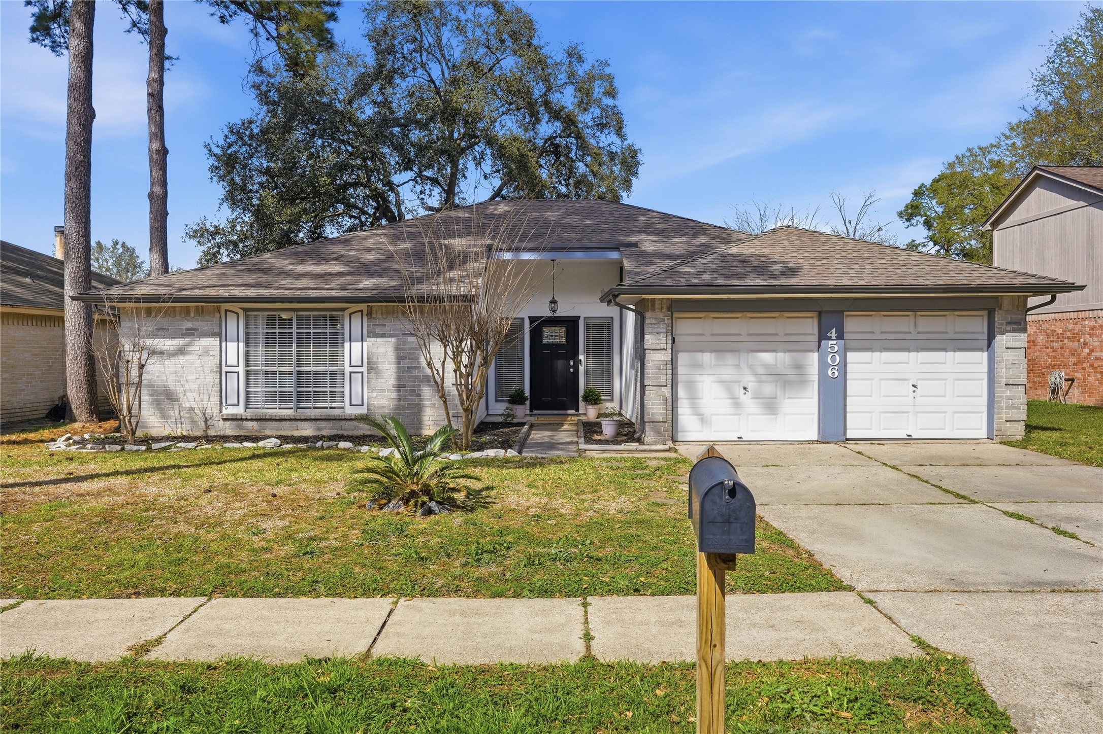 Charming single-story home with spacious front yard