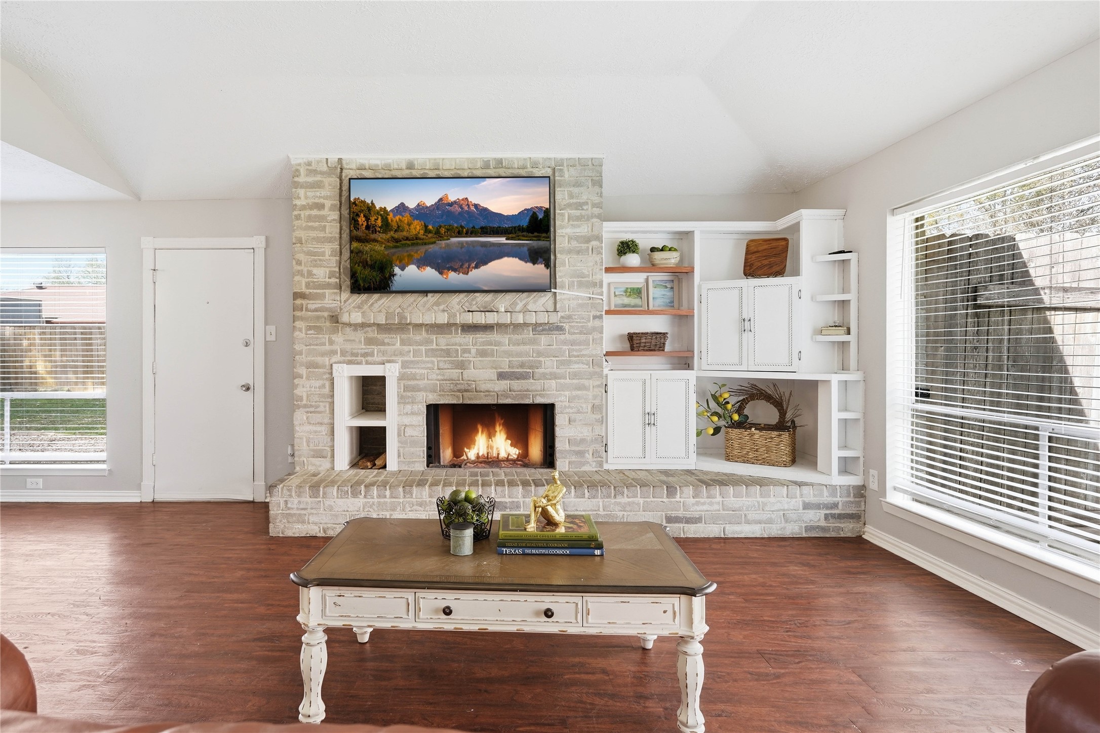 4506 Pineville Lane Spring, TX 77388 - Photo 2 of 36 Bright living room with cozy fireplace & built-ins