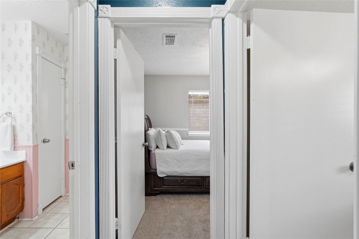 4506 Pineville Lane Spring, TX 77388 - Photo 29 of 36 Secondary bedroom with easy access to the nearby bathroom, ideal for guests or a home office.