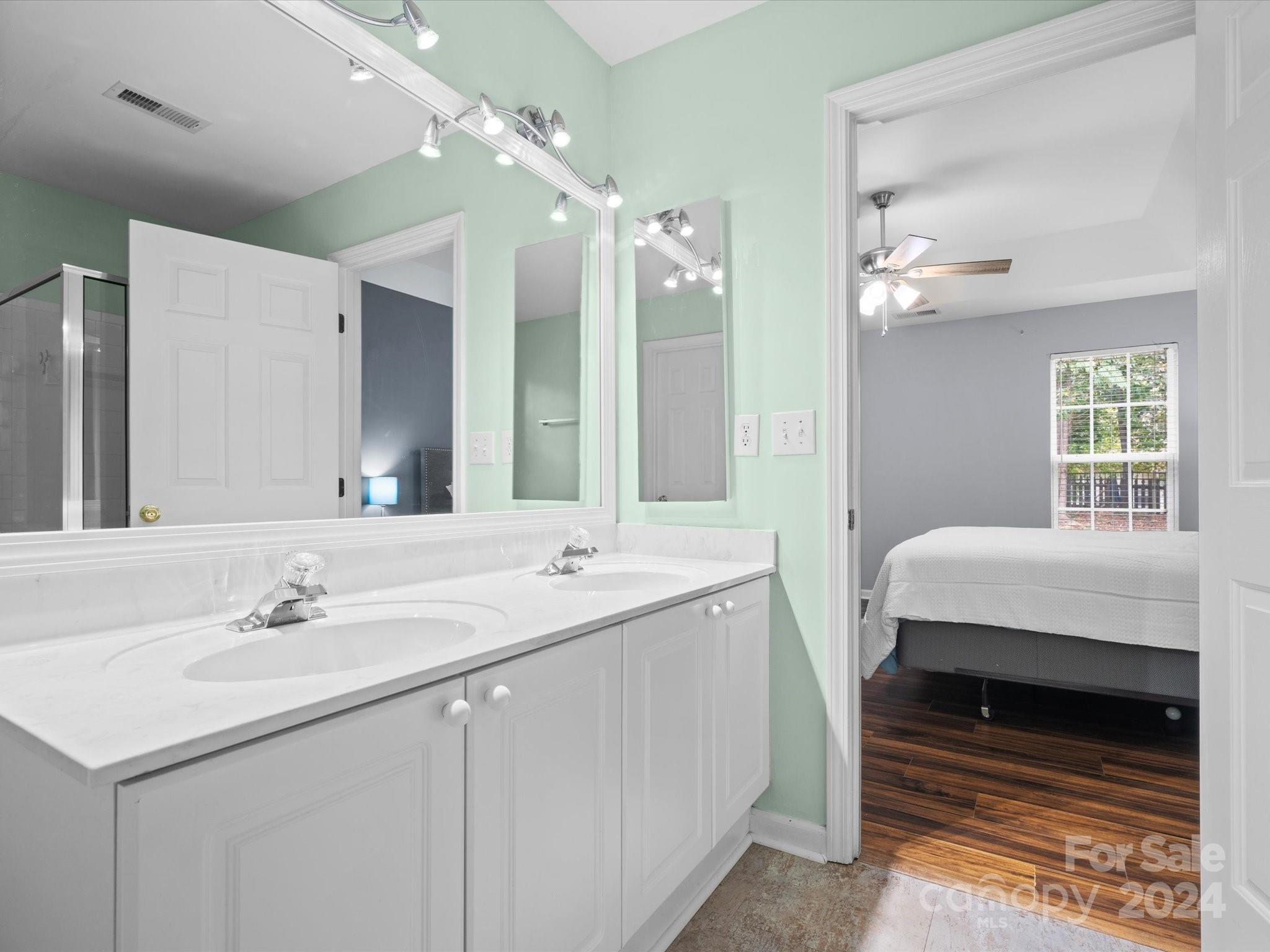 2010 Fairburn Court Fort Mill, SC 29708 - Photo 19 of 39 a bathroom with a sink and a mirror