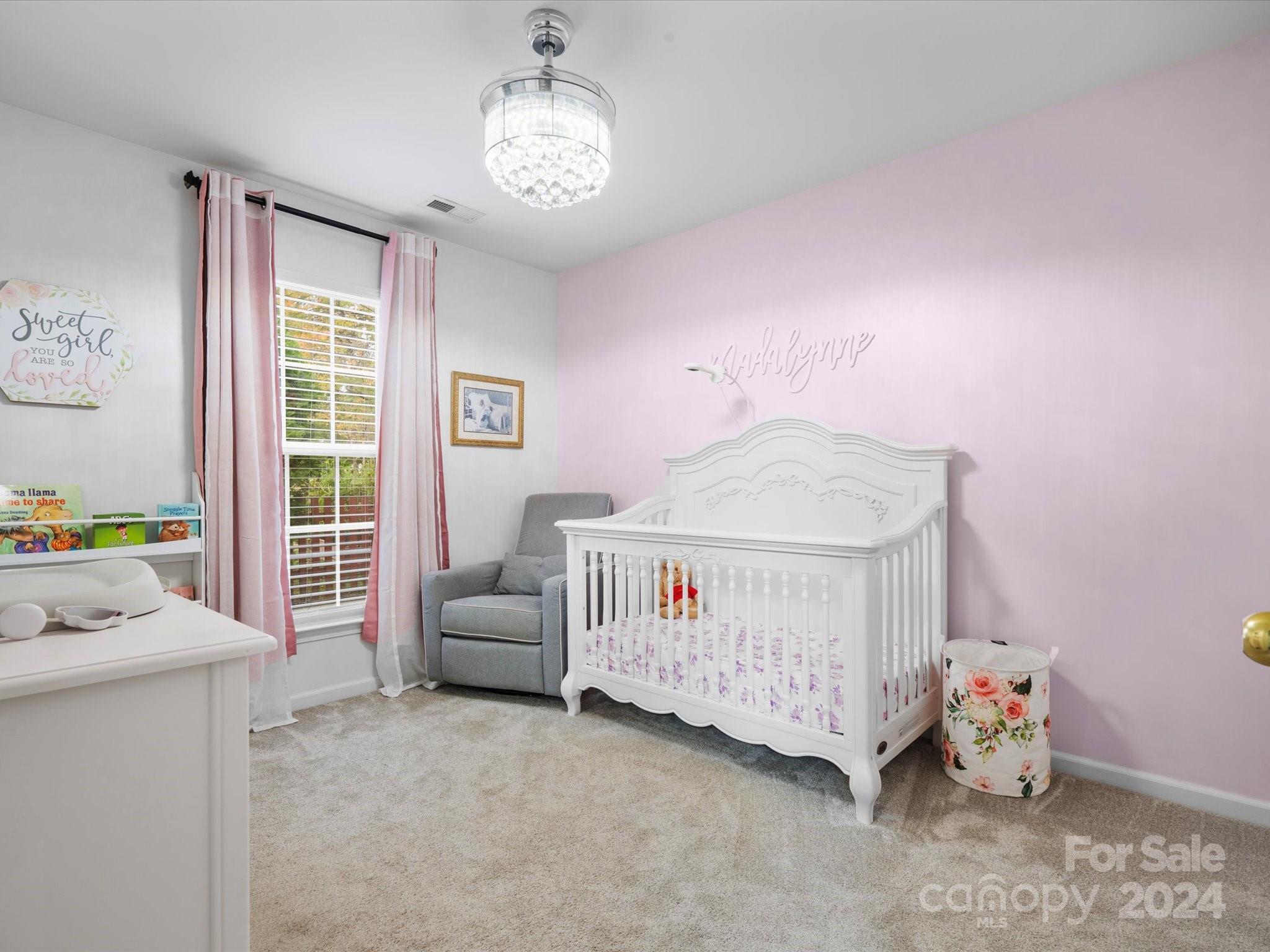 2010 Fairburn Court Fort Mill, SC 29708 - Photo 21 of 39 a bedroom with furniture and a window