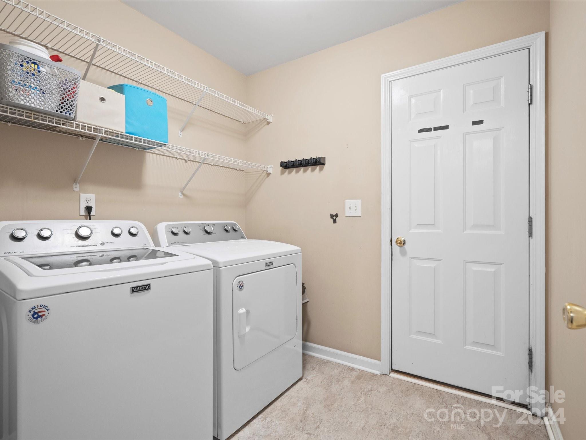 2010 Fairburn Court Fort Mill, SC 29708 - Photo 23 of 39 a utility room with dryer and washer