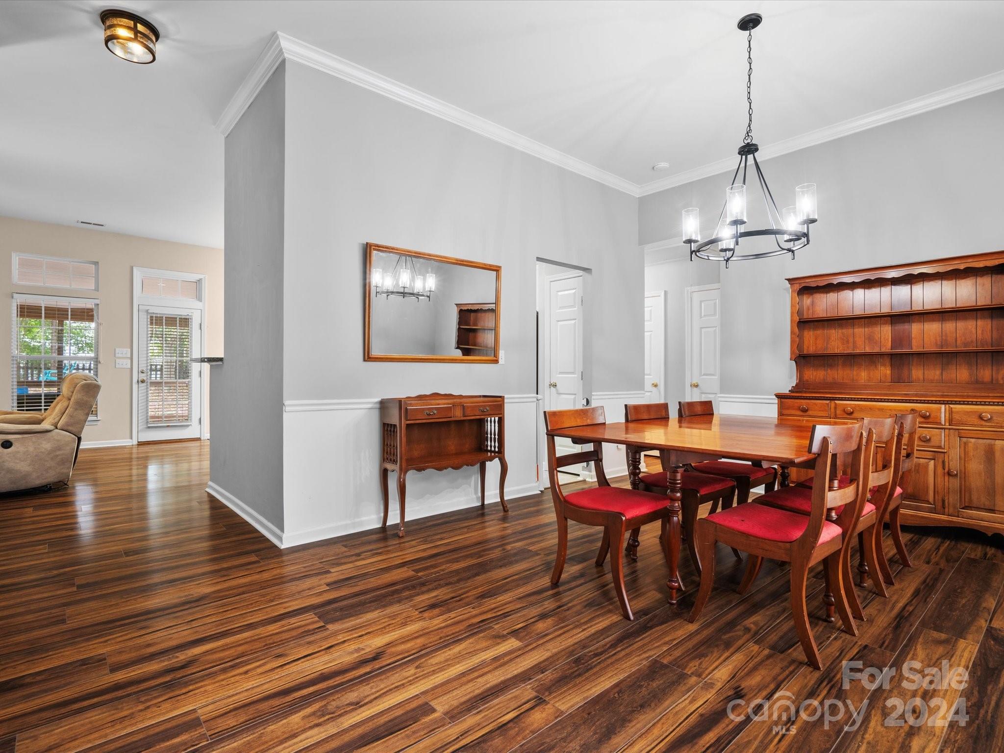 2010 Fairburn Court Fort Mill, SC 29708 - Photo 6 of 39 a view of a dining room with furniture and wooden floor