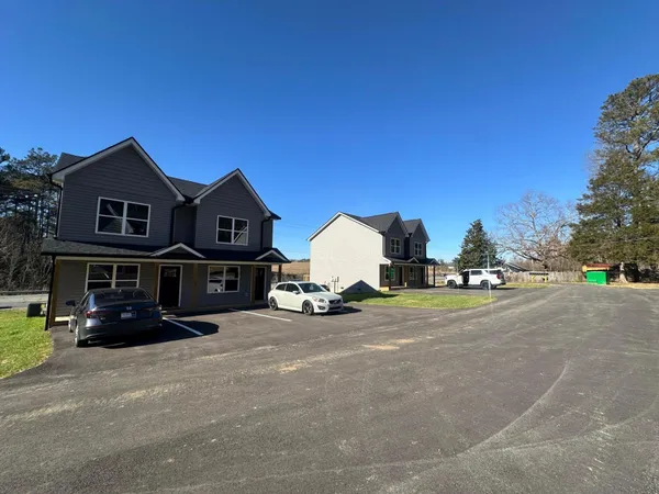 a view of a house with a street