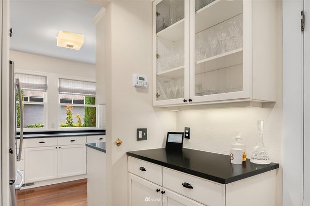 a view of a chairs and table in the patio