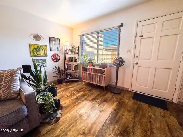 a living room with furniture and a window