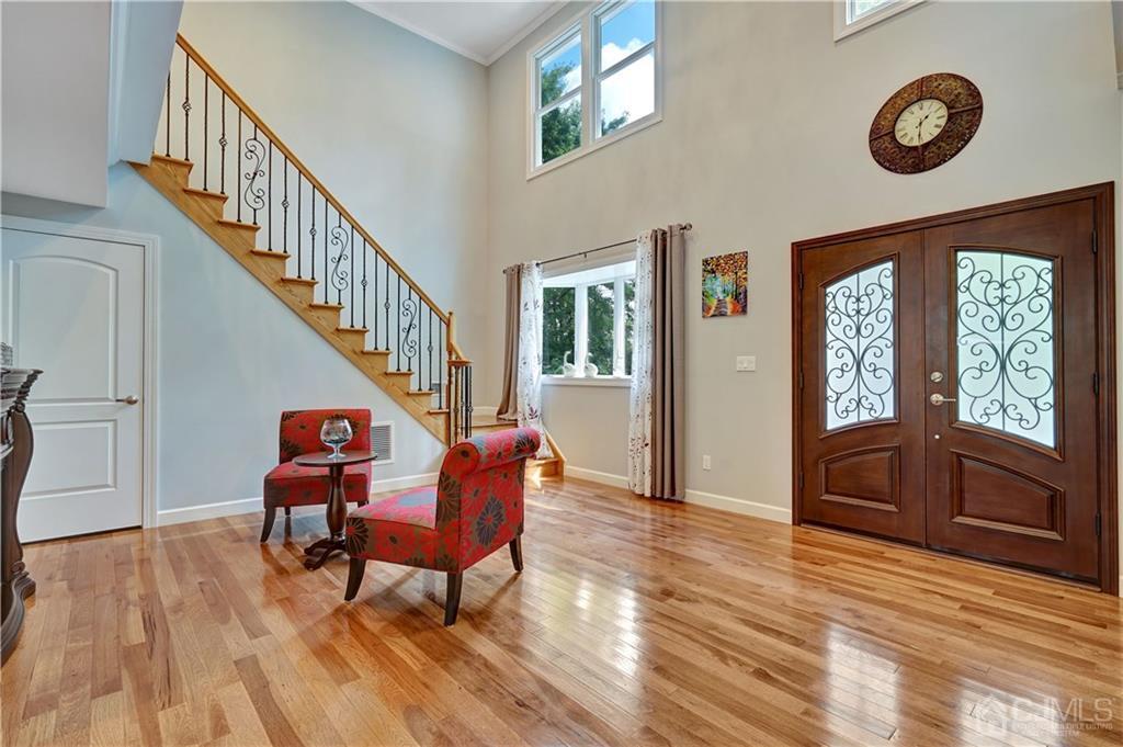 1871 Raritan Road Scotch Plains, NJ 07076 - Photo 4 of 22 a living room with furniture and a wooden floor