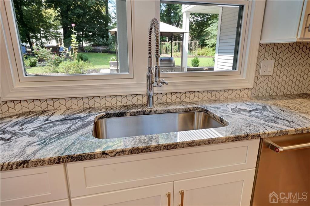 1871 Raritan Road Scotch Plains, NJ 07076 - Photo 8 of 22 a close view of sink and tap
