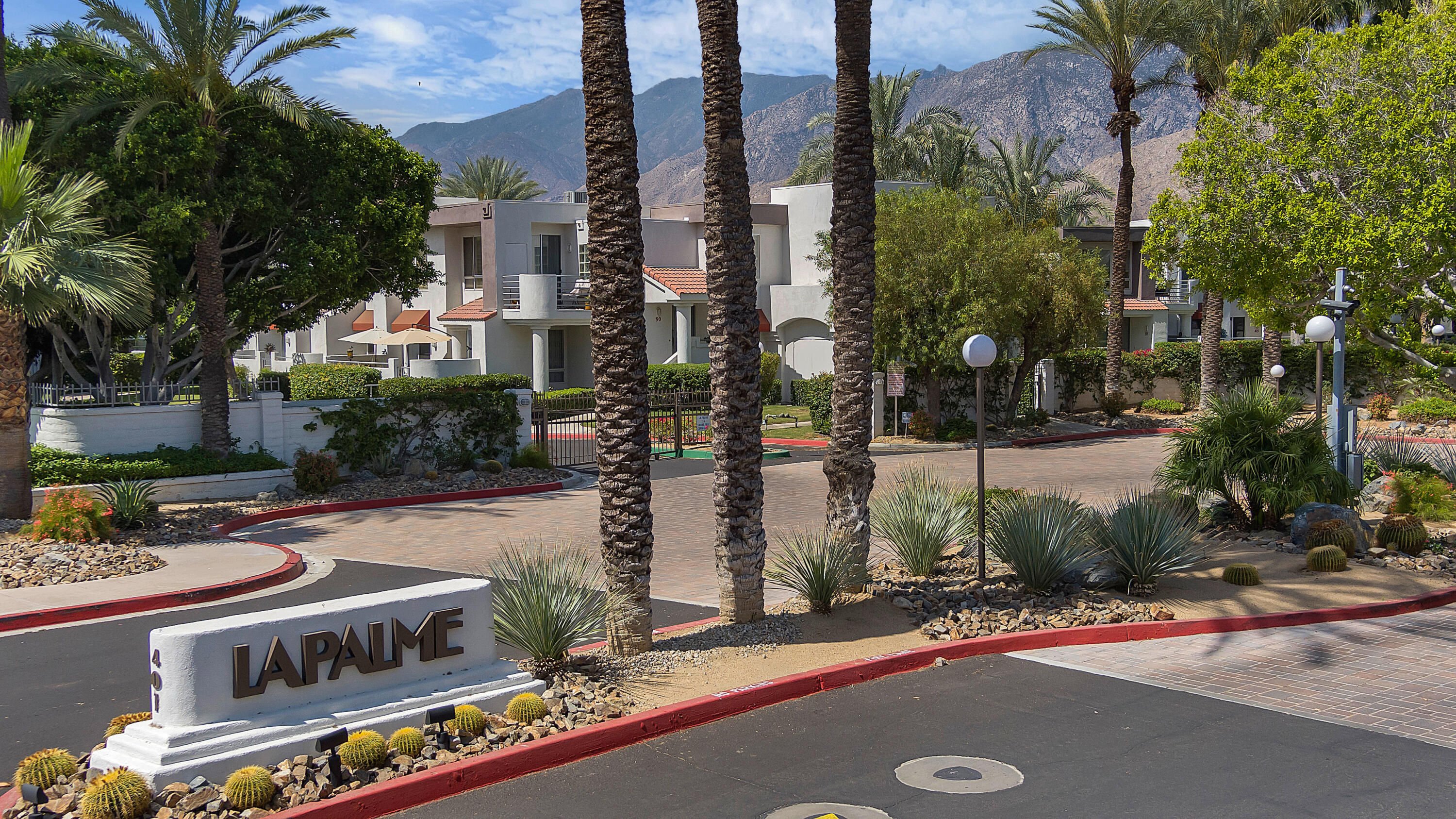 401 El Cielo Road, Unit 84 Palm Springs, CA 92262 - Photo 7 of 7 front view of a building with a street