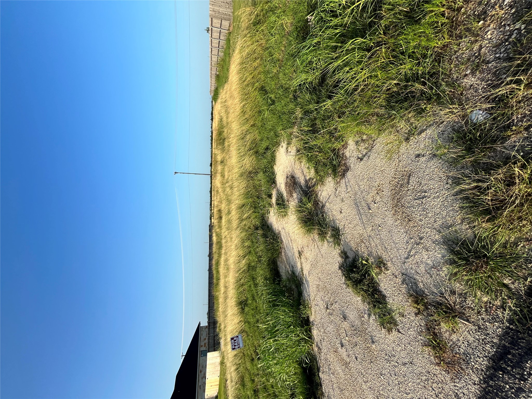 360 Meadow Valley Loop Jarrell, TX 76537 - Photo 5 of 8 a view of an ocean and a beach