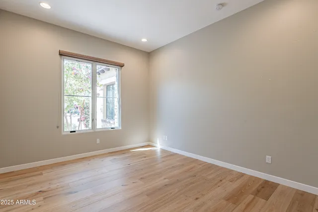 a view of kitchen with sink and wooden floor