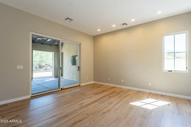 a view of kitchen with cabinets and stainless steel appliances