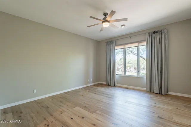 a view of a storage and utility room with racks on the wall