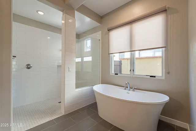 a bathroom with a granite countertop sink a mirror and a vanity