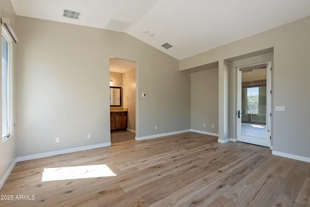 a view of a room with sliding glass door