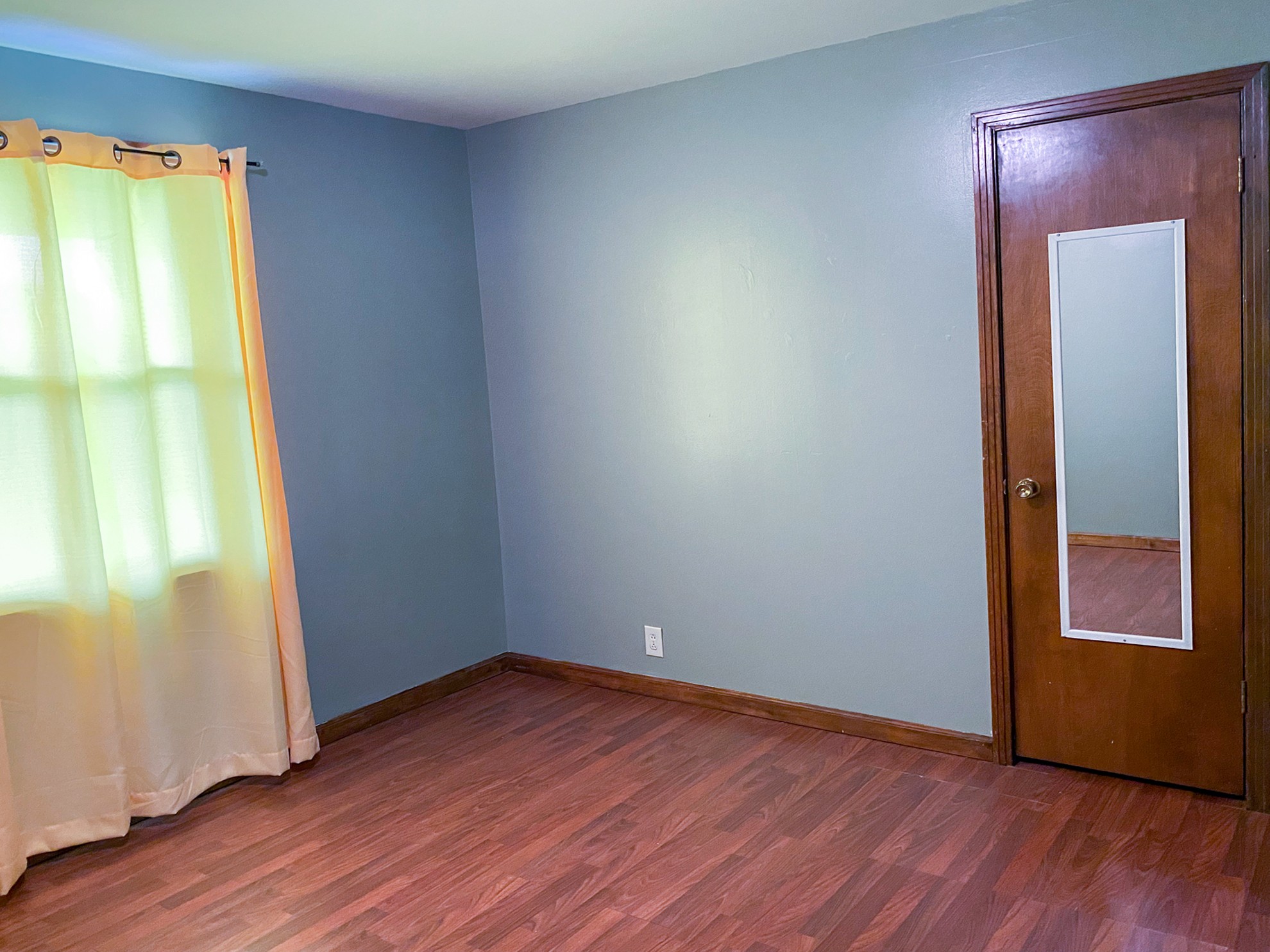 5366 Marion Road Cunningham, TN 37052 - Photo 15 of 29 an empty room with wooden floor and windows