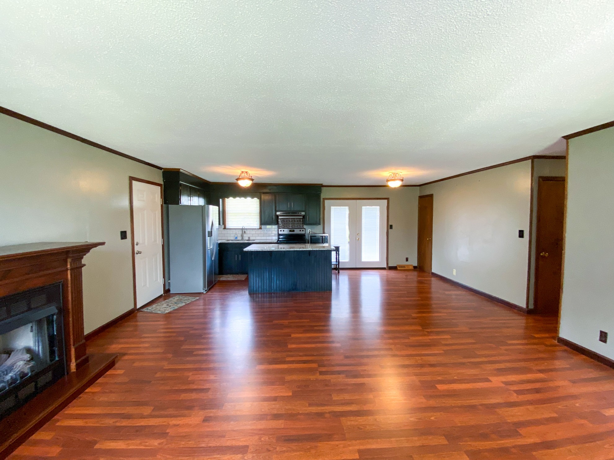 5366 Marion Road Cunningham, TN 37052 - Photo 6 of 29 a view of kitchen and hall with wooden floor