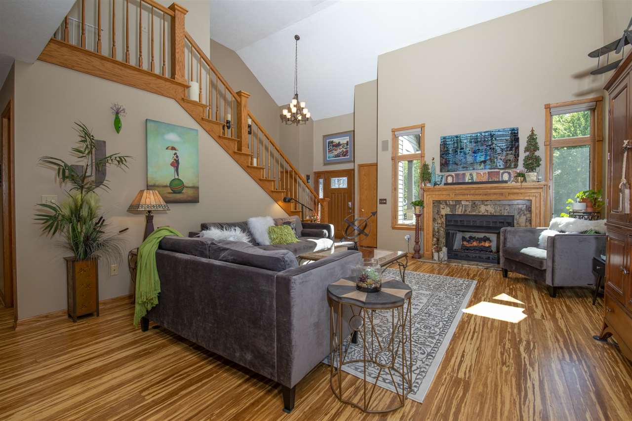 2858 Lark Rise Rockford, IL 61114 - Photo 8 of 33 a living room with furniture and a fireplace