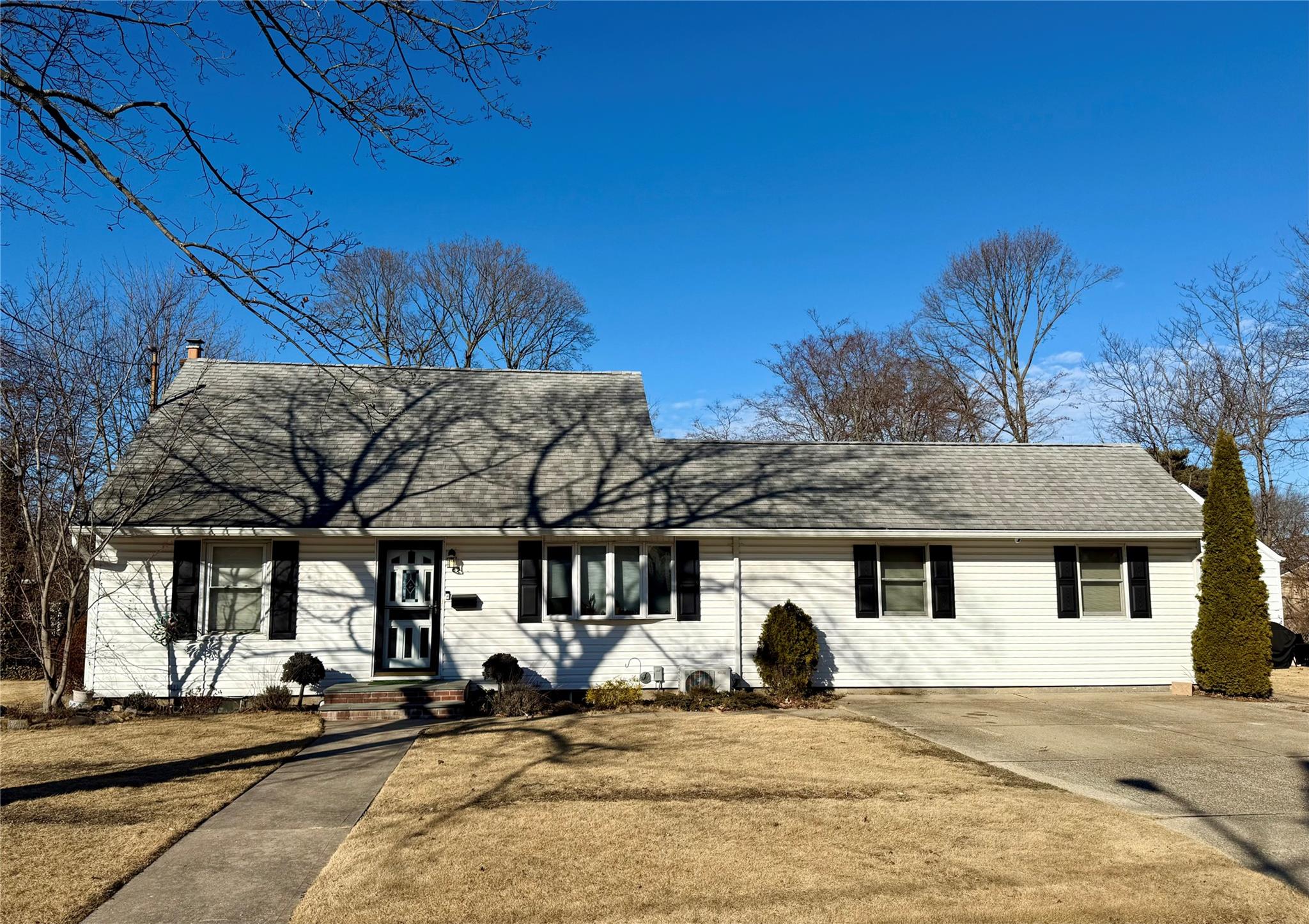 83 Heathcote Road Lindenhurst, NY 11757 - Photo 1 of 1 a view of a house with a patio