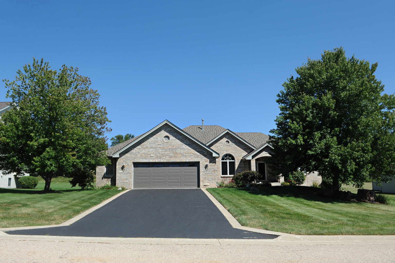 2572 3 Forks Road Belvidere, IL 61008 - Photo 2 of 2 a front view of a house with a yard
