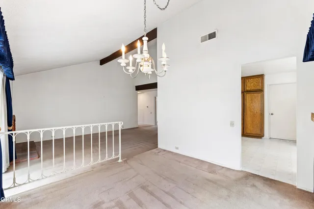 a view of a kitchen with a sink