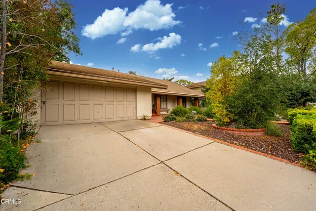a house view with a outdoor space