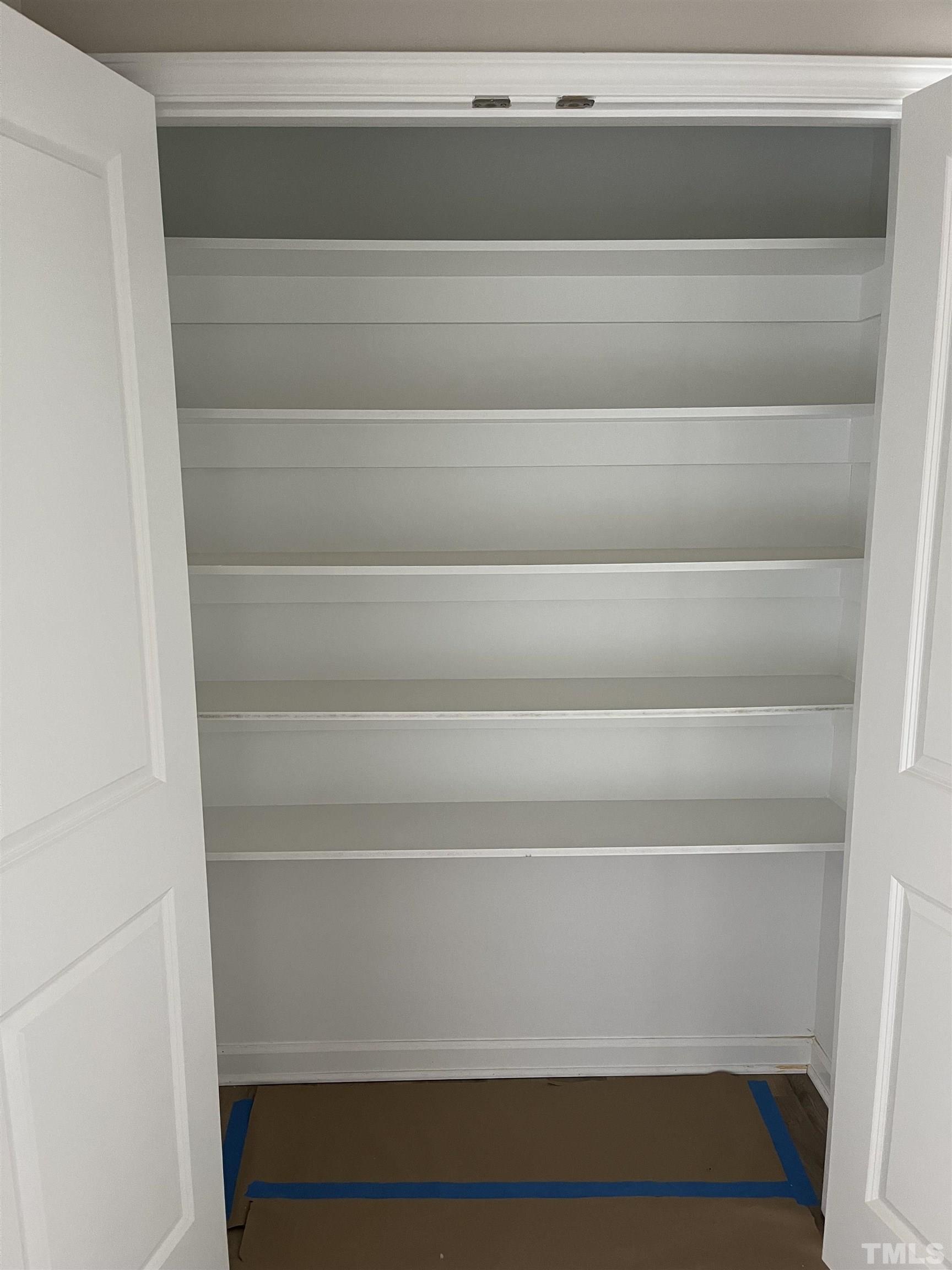 11016 Selma Road Middlesex, NC 27557 - Photo 12 of 22 a view of walk in closet with empty racks