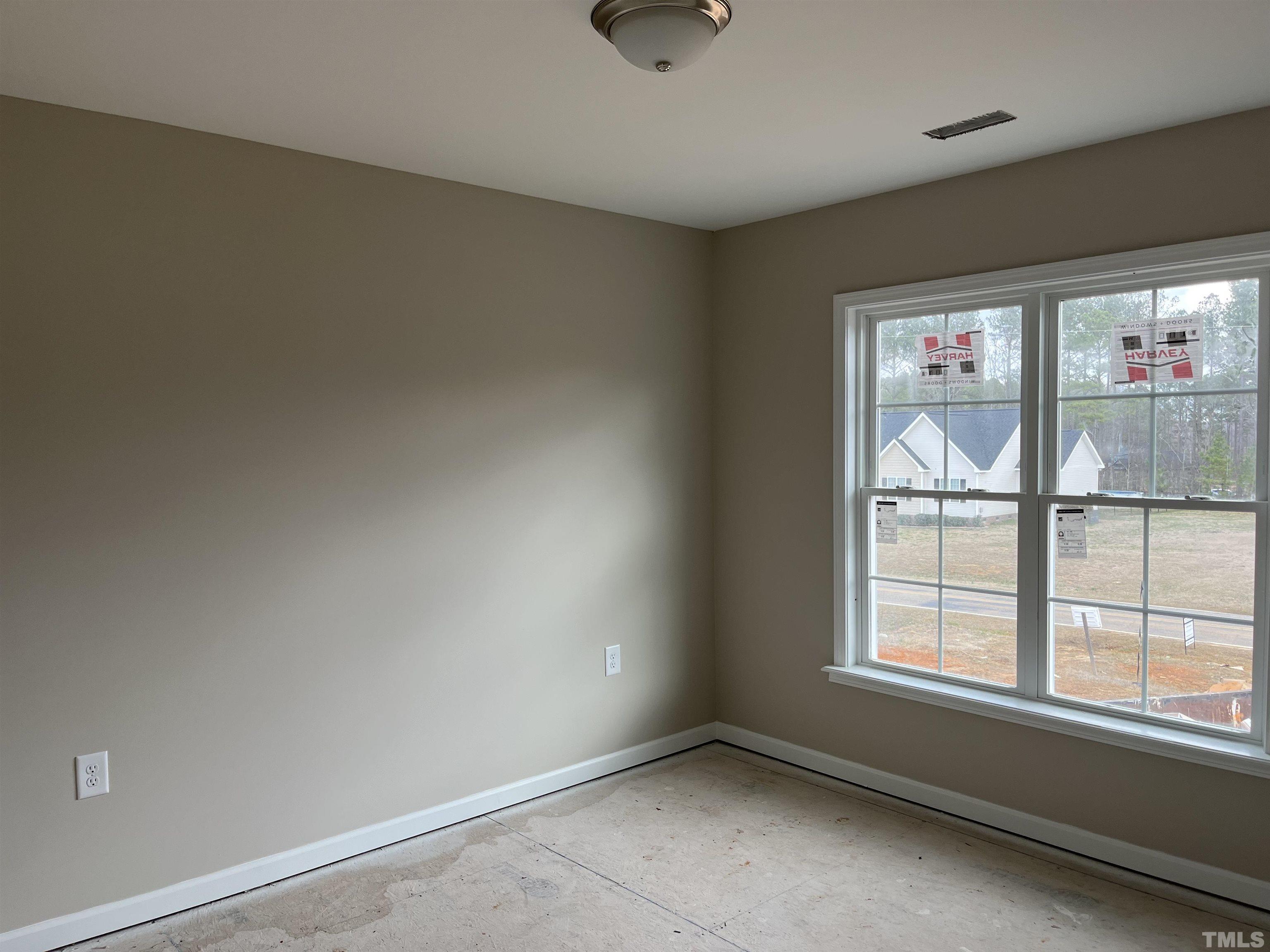 11016 Selma Road Middlesex, NC 27557 - Photo 17 of 22 an empty room with windows