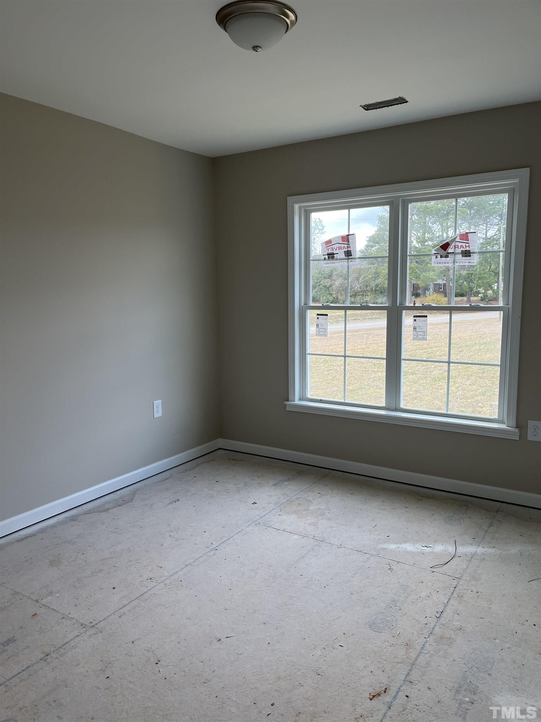11016 Selma Road Middlesex, NC 27557 - Photo 19 of 22 an empty room with a window