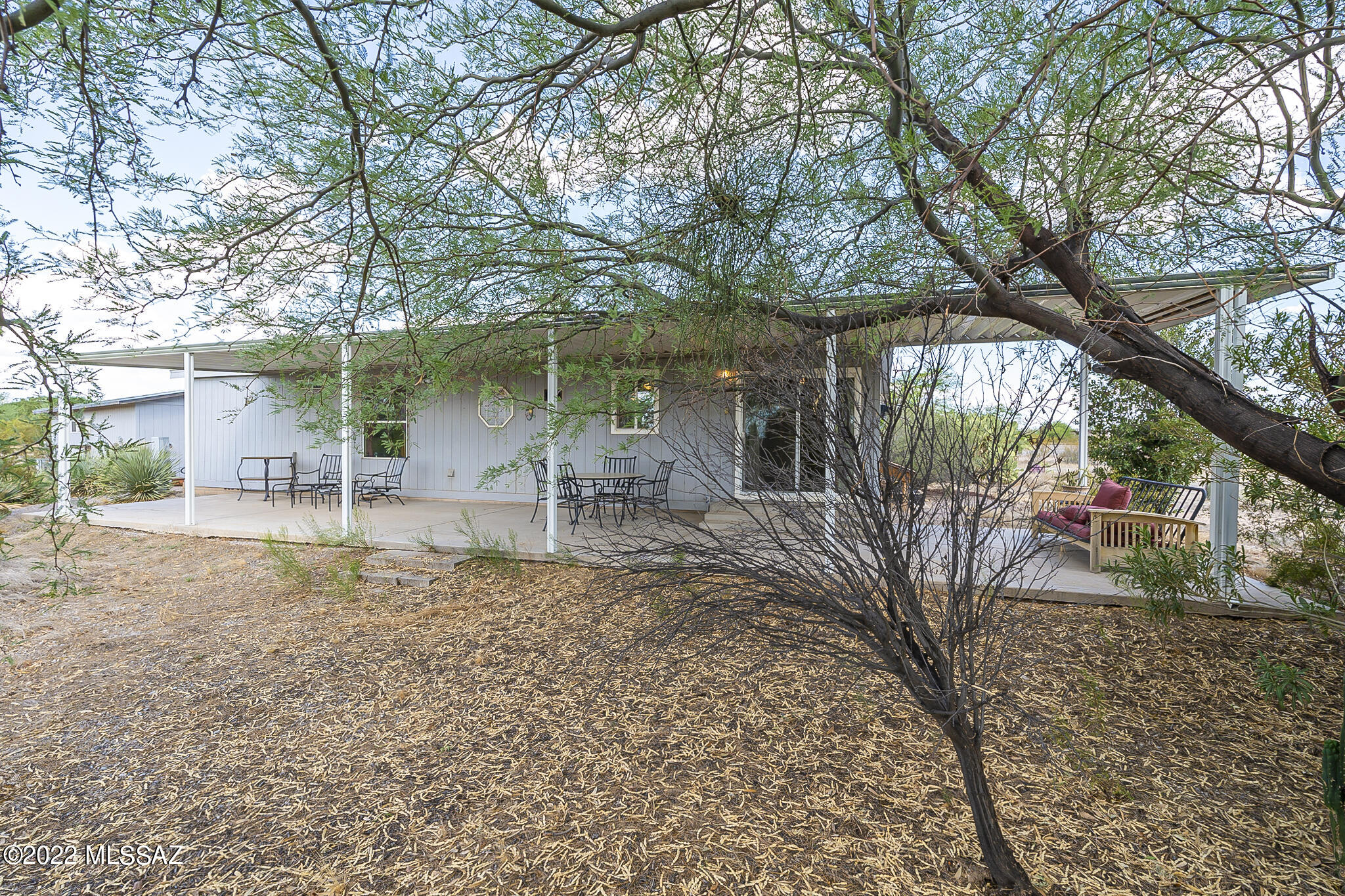 5285 North Puma Road Marana, AZ 85653 - Photo 40 of 46 a house with trees in front of it