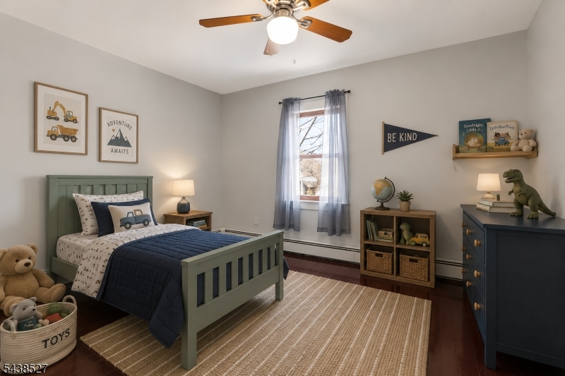 83 Highway 15 Lafayette, NJ 07848 - Photo 10 of 20 a bedroom with a bed and a chandelier
