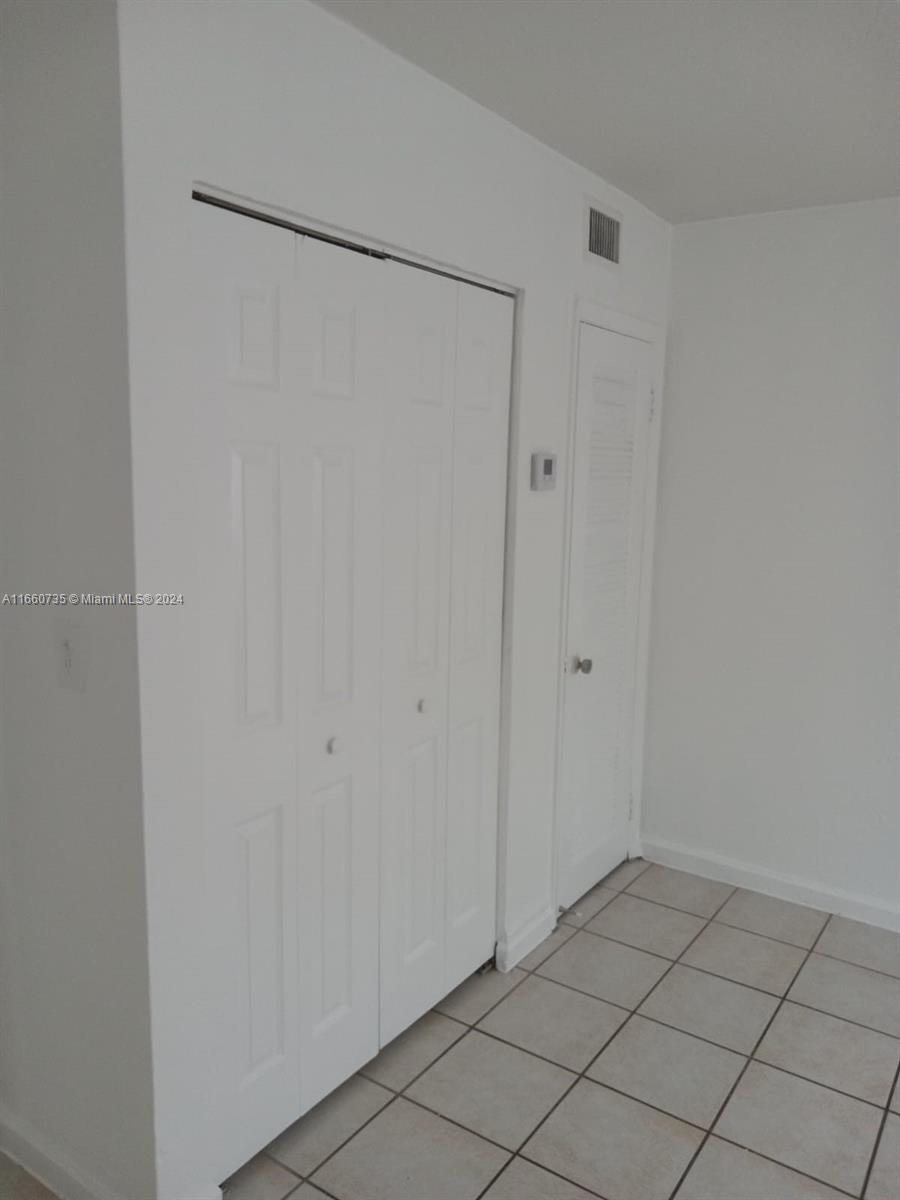 1230 West 54th Street, Unit 216A Hialeah, FL 33012 - Photo 16 of 28 a view of an empty room