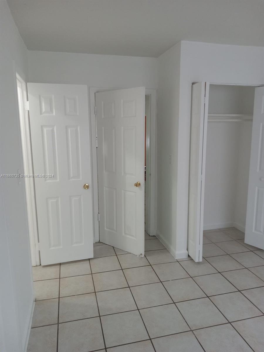 1230 West 54th Street, Unit 216A Hialeah, FL 33012 - Photo 18 of 28 a view of an empty room