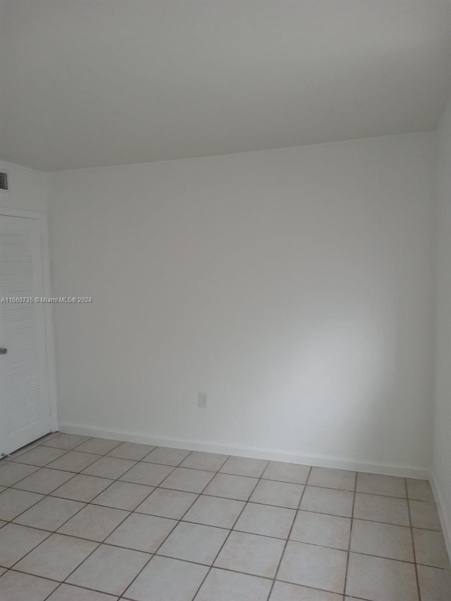 1230 West 54th Street, Unit 216A Hialeah, FL 33012 - Photo 20 of 28 a view of an empty room