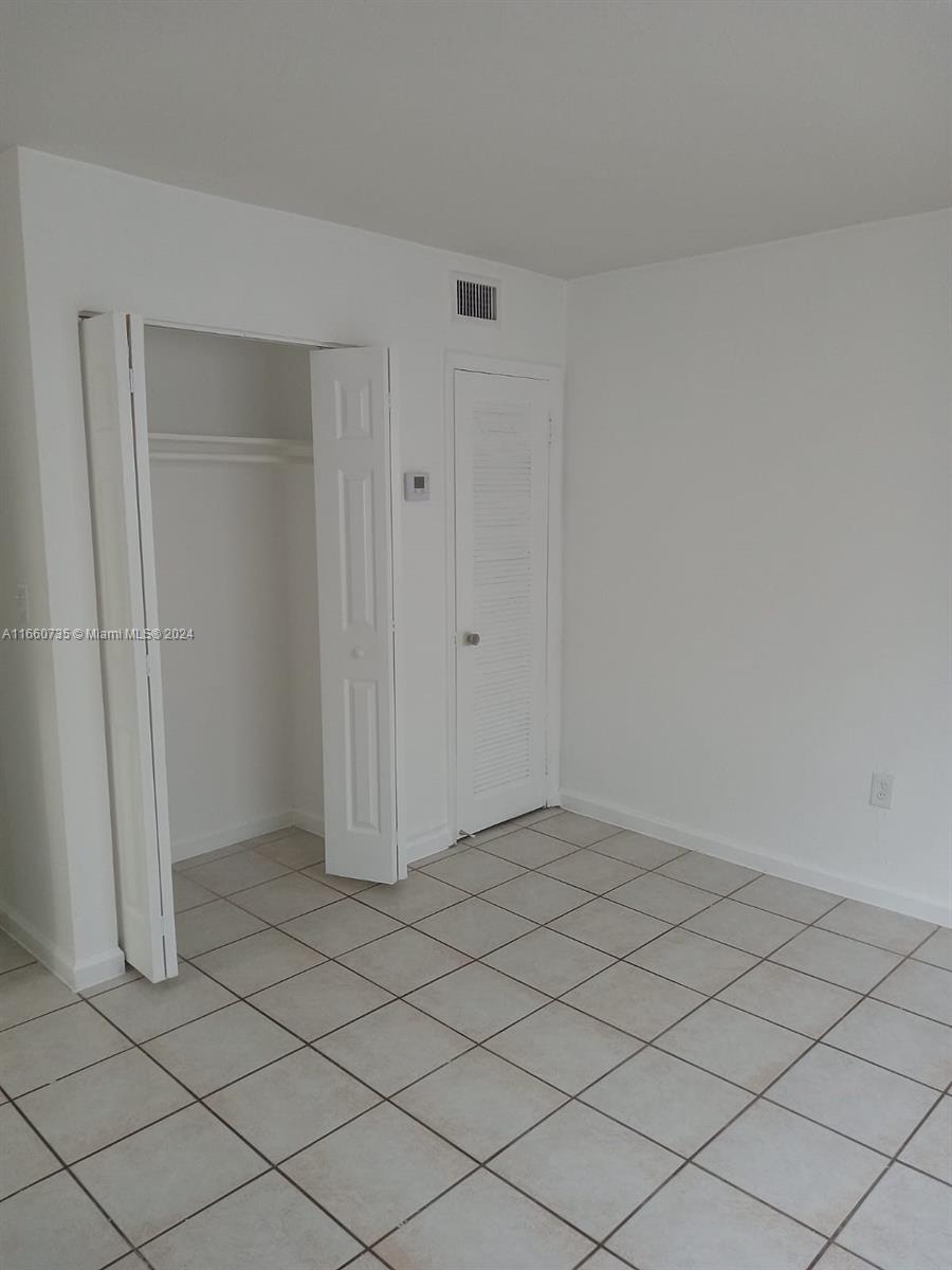 1230 West 54th Street, Unit 216A Hialeah, FL 33012 - Photo 21 of 28 a view of empty room