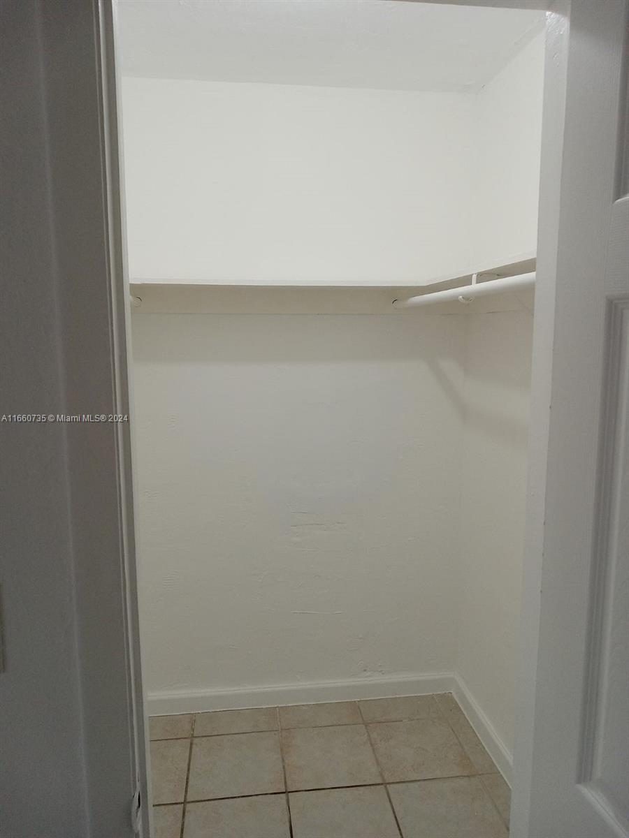 1230 West 54th Street, Unit 216A Hialeah, FL 33012 - Photo 28 of 28 a view of a closet