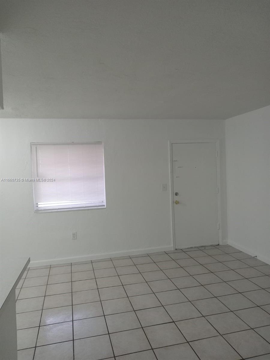 1230 West 54th Street, Unit 216A Hialeah, FL 33012 - Photo 5 of 28 a view of an empty room