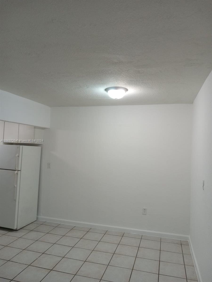1230 West 54th Street, Unit 216A Hialeah, FL 33012 - Photo 9 of 28 a view of an empty room