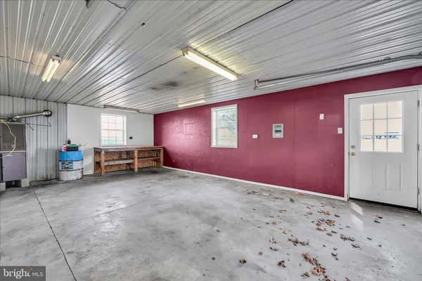 a view of a room with wooden walls