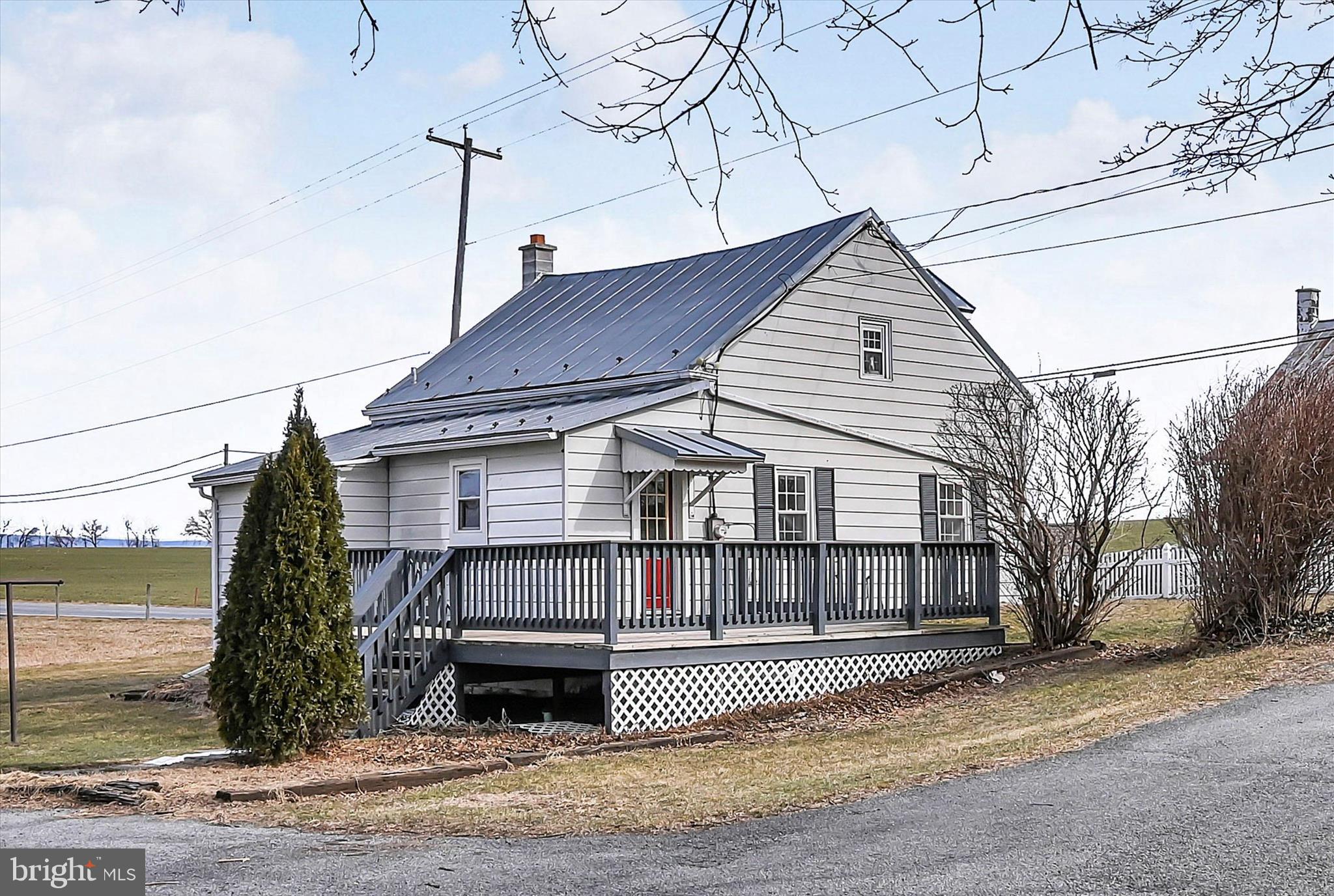 470 Weavertown Road Myerstown, PA 17067 - Photo 33 of 38 a white house that has a small yard and large trees