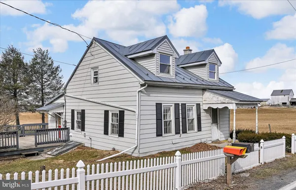 a front view of a house with a porch