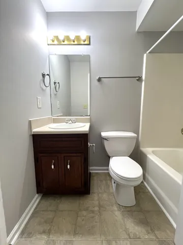 a bathroom with a sink and a toilet