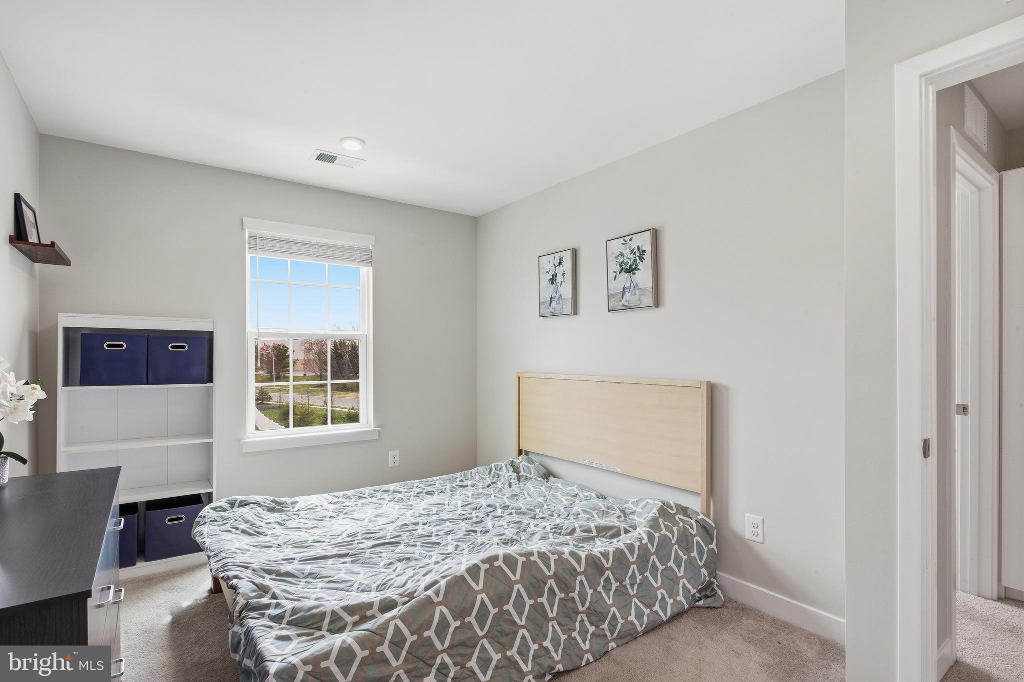 103 Freedom Way Sicklerville, NJ 08081 - Photo 24 of 43 a bedroom with a bed and a window
