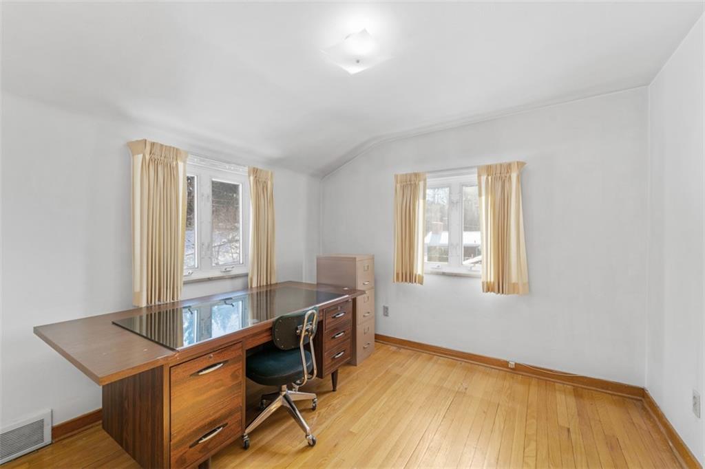 165 Cherrydell Drive Pittsburgh, PA 15220 - Photo 23 of 33 Bedroom 3 reveals hard wood floor underneath carpeting.