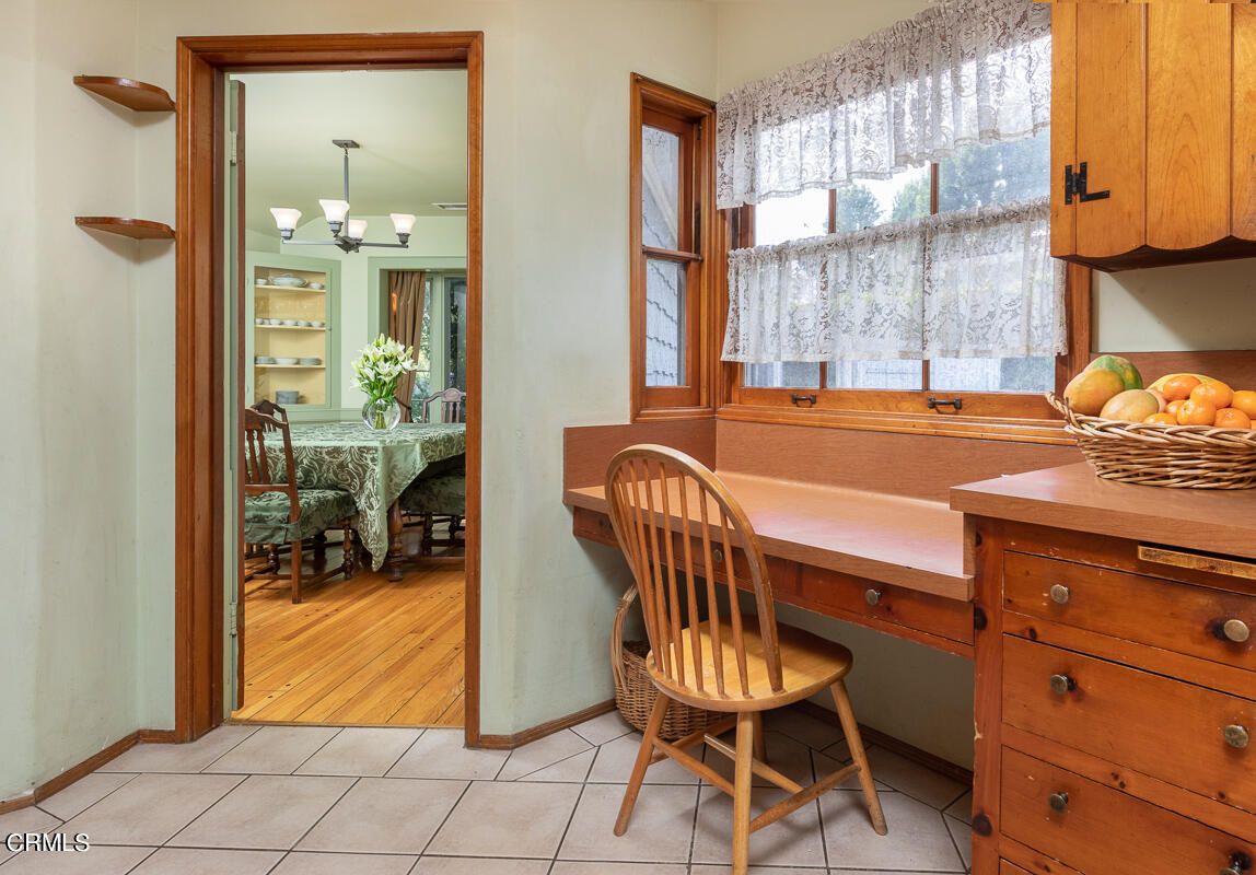 424 North Old Ranch Road Arcadia, CA 91007 - Photo 15 of 54 a view of a dining room with furniture and a chandelier